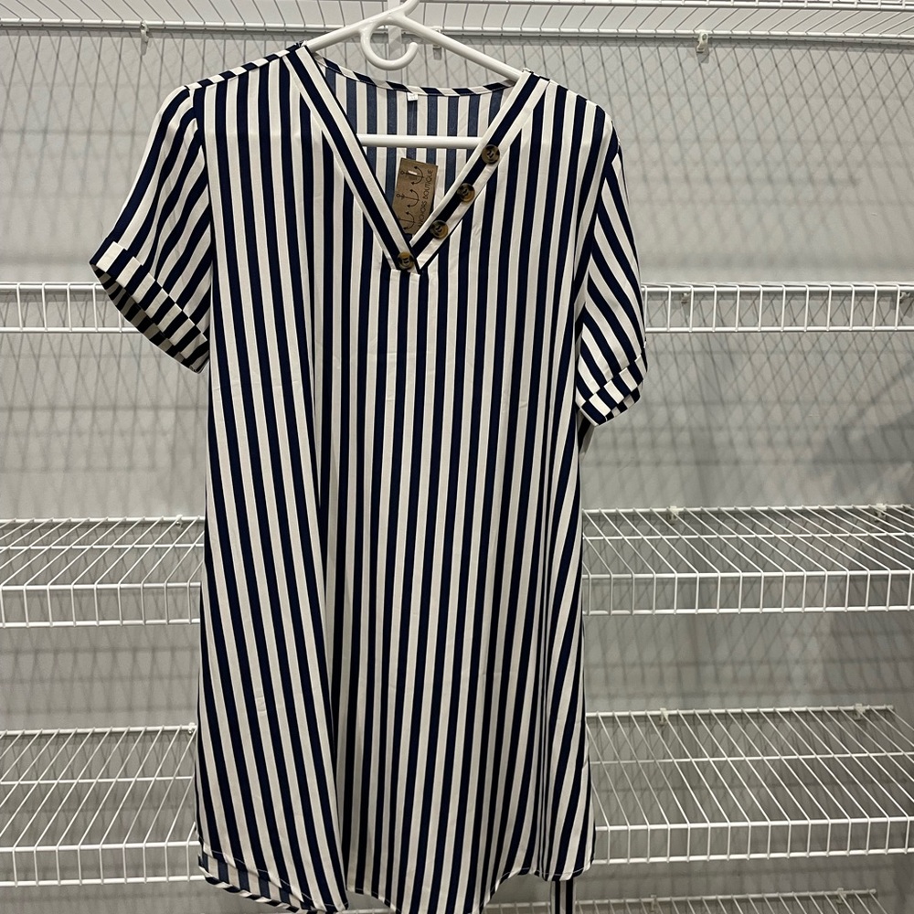 Brand new with tags Navy and White strip shirt dress.